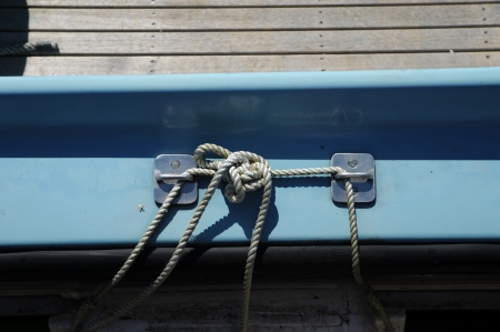 white knot on a blue boatの写真素材