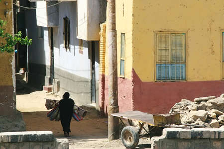 Egiptian woman walkingの写真素材