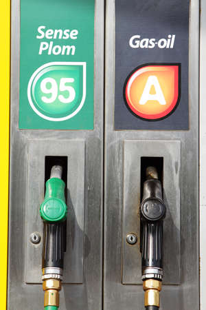 Detail of hoses of petrol pump at a gas station