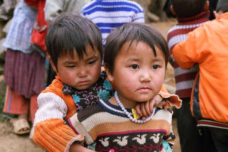 HA GIANG, VIETNAM  - DECEMBER 7  Unidentified kids on December 7, 2011 in mountainous district of...