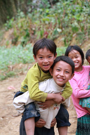 HA GIANG, VIETNAM  - DECEMBER 7  Unidentified kids on December 7, 2011 in mountainous district of Dong Van  Dong Van is the northernmost district of Vietnam and bordering with China のeditorial素材