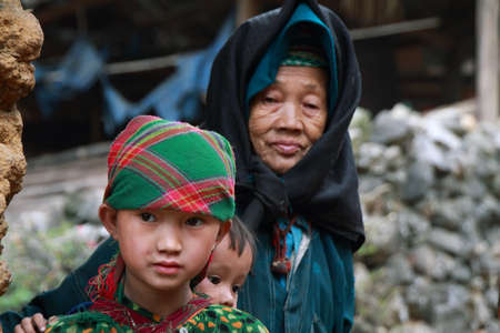 HA GIANG, VIETNAM  - DECEMBER 7  Unidentified kids on December 7, 2011 in mountainous district of Dong Van  Dong Van is the northernmost district of Vietnam and bordering with China 