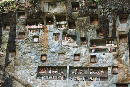 Indonesia, Tana Toraja - Londa, is a very extensive burial cave at the base of a massive cliff face...
