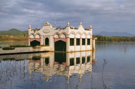 View of old bathhouse in Lake of Banyoles, Catalonia, Spainの写真素材