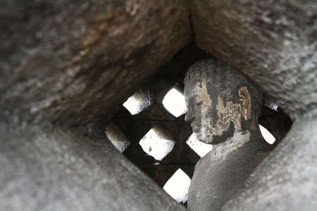 Detail of Buddha in Borobudur Temple. Yogyakarta, Java, Indonesia.の写真素材