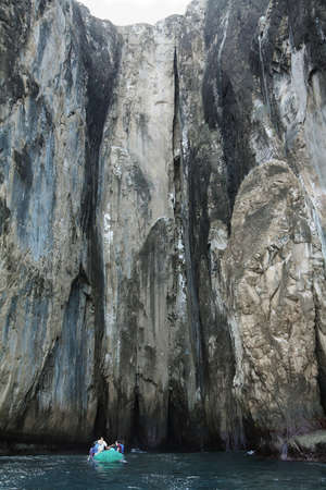 GALAPAGOS, ECUADOR - APRIL 29: Tourist people visiting tall rock formations of Witch Hill on April...