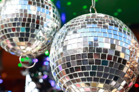 Big Christmas baubles hanging in a local market stall