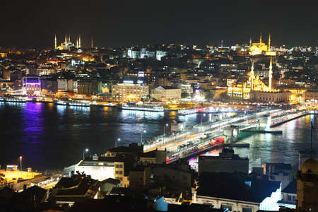 ISTANBUL - NOVEMBER 27: Views of Galata Bridge at night from Galata tower on November 27, 2014 in Istanbul, Turkeyのeditorial素材