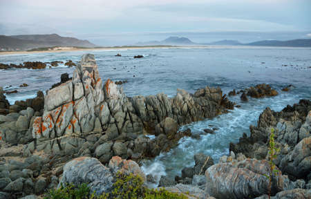 Sunset in idyllic beach of Kleinmond, South Africa
