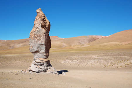 Geological monolith Known as Monjes de la Pakana close to Salar Aguas Calientes, Atacama desert, Chileの写真素材