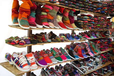 Market stall with colorful shoes in Tilcara, Jujuy province, Argentina