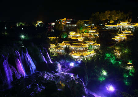 Furong (Hibiscus) ancient village and its waterfall at night, Hunan province, China.の写真素材