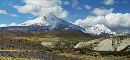 Smoky Guallatire volcano in Chileの写真素材