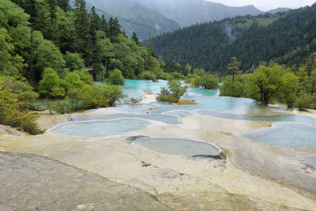 Flamboyant Pond in Huanlong scenic Area, Unesco world heritage site in Sichuan Province, China