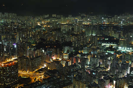 Skyline of the skyscrapers illuminated at night in Hong Kong.のeditorial素材