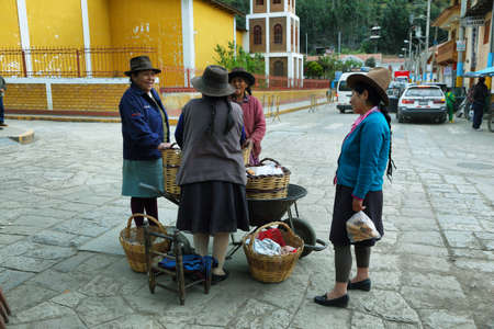 Chacas, Peru - June 9, 2017: indigenous people in a food stall in village of Chavin de Huantar, Ancash province, Peru.のeditorial素材