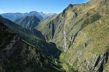 Sheer mountains in the way to ancient village of Huaquis in Nor Yauyos Cochas, Peruの写真素材