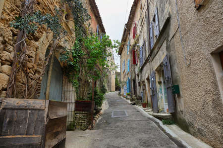 Bonnieux, France - April 21, 2019: View of a narrow street in Bonnieux, village of Provence region in Franceのeditorial素材