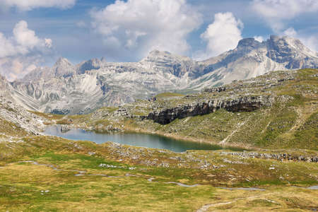 Scenic Mountains and lake in Puez-odle nature park in the dolomite alps, Italy