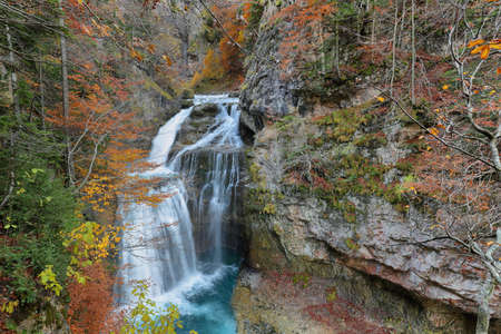 Aripas waterfall in an autumn scene in Ordesa and Monte Perdido National Park, Huesca province, Spainの写真素材