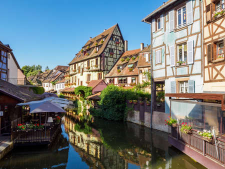 Colorful traditional french houses on the side of river Lauch in Colmar city of Alsace region, Franceの写真素材