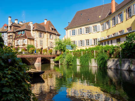 Colorful traditional french houses on the side of river Lauch in Colmar city of Alsace region, Franceの写真素材