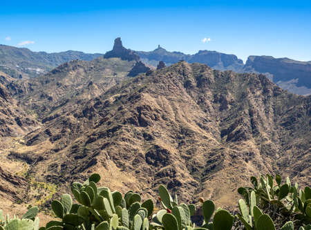 Views of Roque Nublo and Roque Bentayga from Acusa Seca caves in Grand Canary island, Canary islands, Spain.の写真素材
