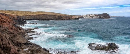 Cliffs with Tufia village at background in Grand Canary island, Spainの写真素材