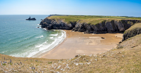 Box Bay and Church rock, Pembrokeshire coast in Wales, United Kingdomの写真素材