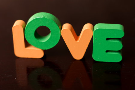 Colorful 3D LOVE word with reflectionの写真素材