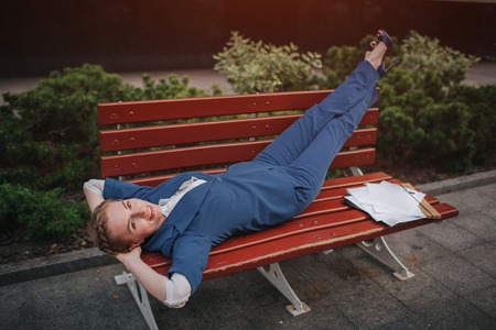 Business Woman is resting after a successful transaction. Break at work. I quit and dreams about restの写真素材