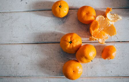 Set of ripe tangerine or mandarin with skin isolated on white background. Juicy tasty delicious...