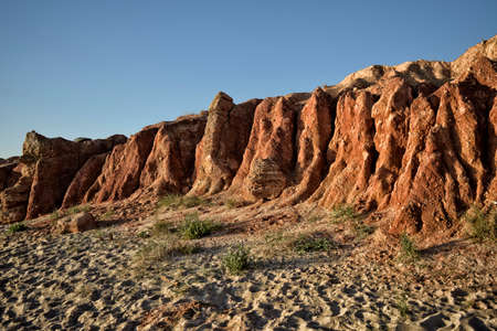 Where the cliff border Begins and ends the beachの写真素材