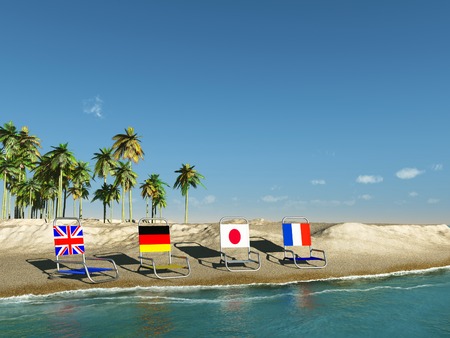 Beach chairs with flagsの写真素材