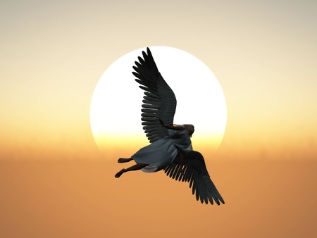 Angel flying in front of the sunの写真素材