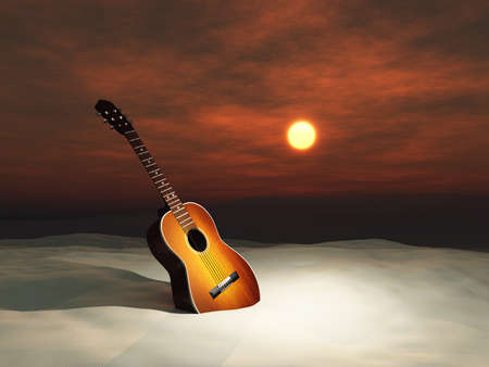 Guitar in the sand at sunsetの写真素材