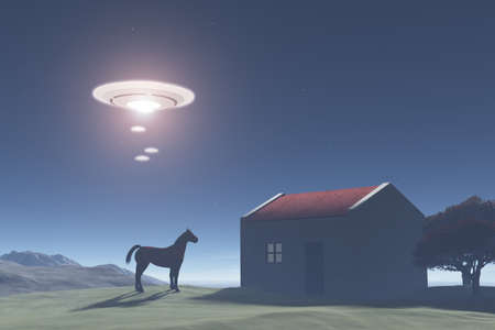 Flying saucers over a rural areaの写真素材
