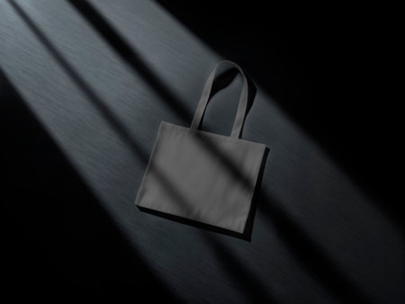 Stylish Tote Bag Mockup on Dark Surface Designの写真素材