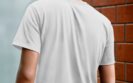 Back View T-shirt against brick wall