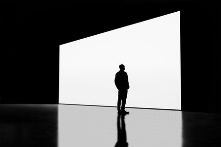Auditorium Screen with Standing Man Silhouetteの写真素材