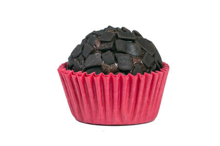 Traditional homemade Brazilian chocolate candy, called brigadeiro, in a gourmet version of dark chocolate. Isolated on white background.の写真素材