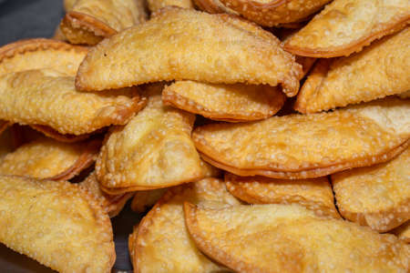 Brazilian snack, called pastel. Pastry background.