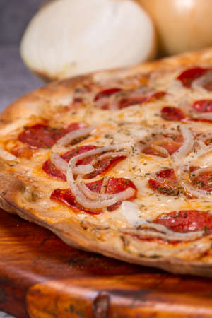 pepperoni pizza on gray background.の写真素材