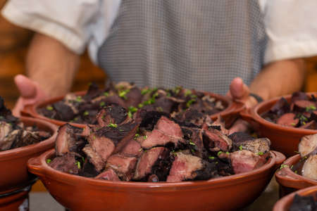 Serving feijoada
feijoada buffet, traditional Brazilian dish
bean stew.の写真素材