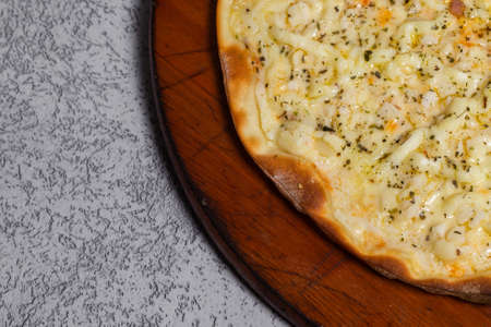 cheese pizza on gray background.の写真素材