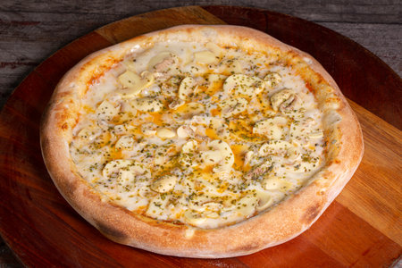 Tasty Mushroom Pizza on wooden background, in Brazil it's called mushroom pizzaの写真素材