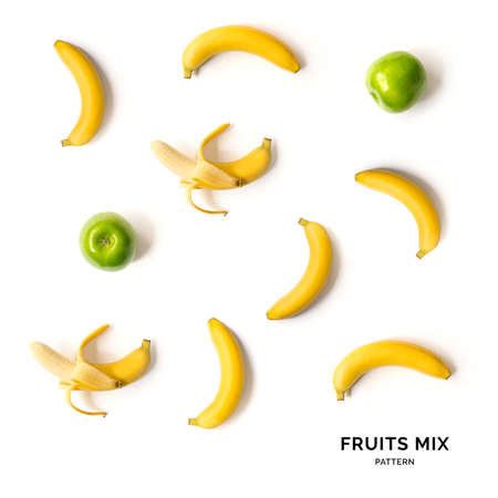 Seamless pattern with fruits. Tropical abstract background. Banana and apple on white background.の写真素材