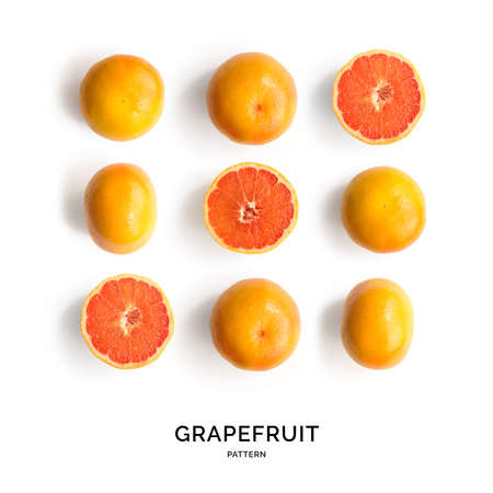 Seamless pattern with grapefruit. Tropical abstract background. Grapefruit on the white background.の写真素材