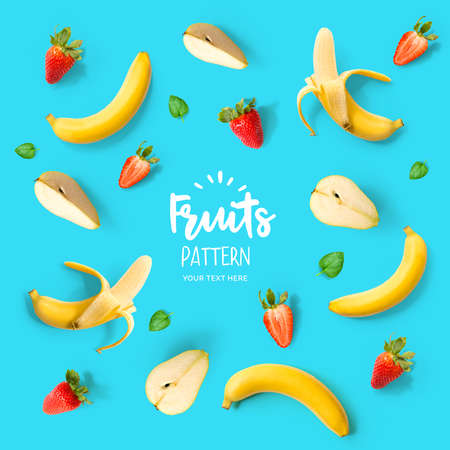 Pattern with banana, strawberry and pear. Tropical abstract background. Banana, strawberry and pear on the blue background.の写真素材