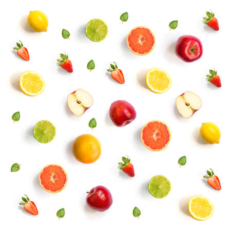 Pattern with grapefruit, strawberry, lime, lemon and apple. Tropical abstract background.  Grapefruit, strawberry, lime, lemon and apple on the white background.の写真素材